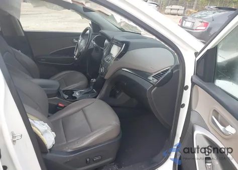 2014 Hyundai Santa Fe Sport 2.4L z USA, uszkodzony, nr VIN 5XYZUDLBXEG210414